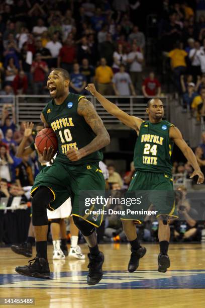 Kyle O'Quinn and Brandon Wheeless of the Norfolk State Spartans celebrate after they won 86-84 against the Missouri Tigers during the second round of...