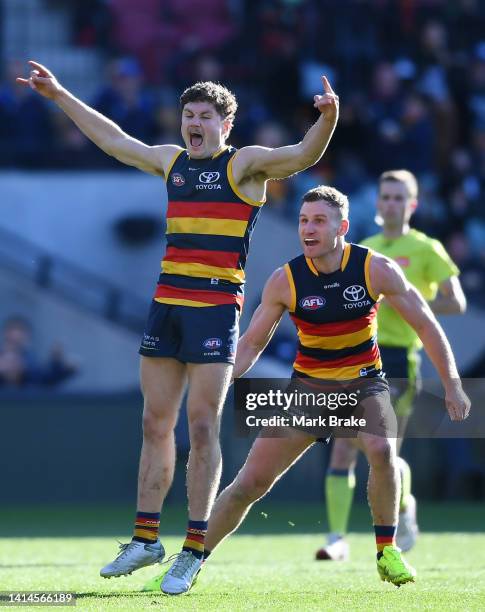 Harry Schoenberg of the Crows celebrates a goal during the round 22 AFL match between the Adelaide Crows and the North Melbourne Kangaroos at...