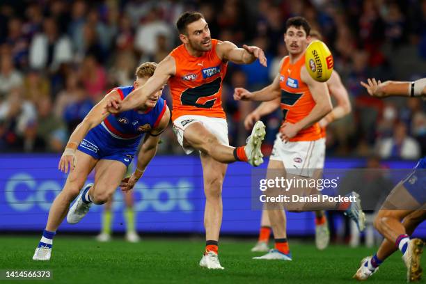 Stephen Coniglio of the Giants kicks for goal during the round 22 AFL match between the Western Bulldogs and the Greater Western Sydney Giants at...