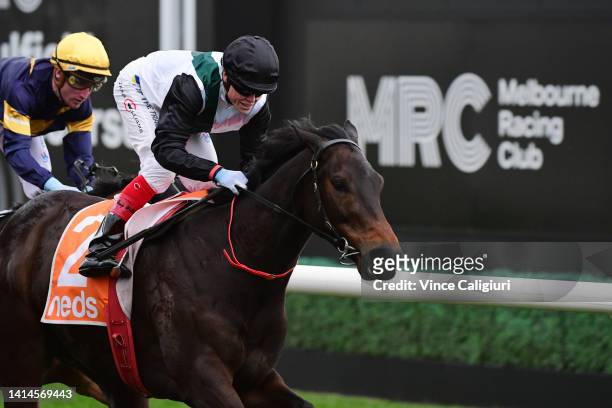 Craig Williams riding Mr Brightside winning Race 8, the P.b. Lawrence Stakes during Melbourne Racing at Caulfield Racecourse on August 13, 2022 in...