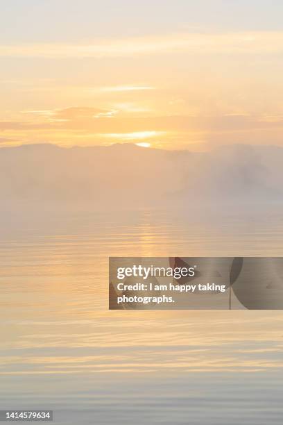 when climbing morning sun in lake hibara - tohoku stockfoto's en -beelden