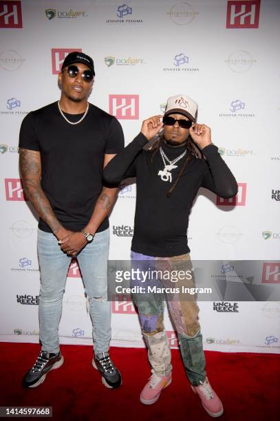 Lecrae and 1K Phew attend the I Am John Gabbana documentary premiere at Riverside EpiCenter on August 12, 2022 in Austell, Georgia.