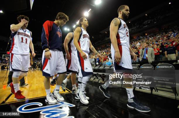 Players from the St. Mary's Gaels including Clint Steindl , Jorden Page and Rob Jones walk off of the court after they lost 72-69 against the Purdue...