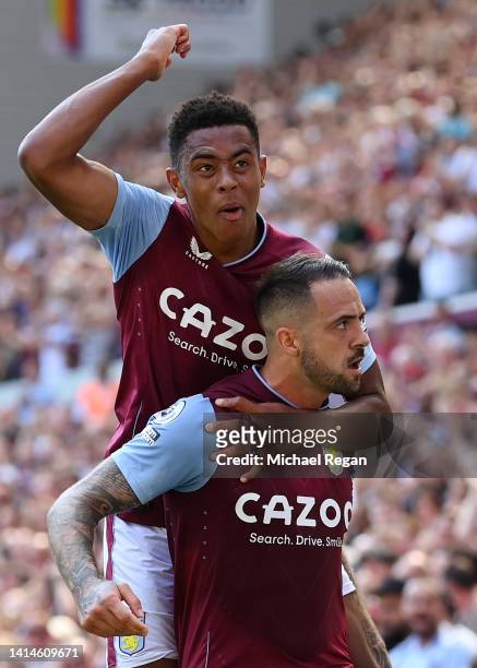 Danny Ings of Aston Villa celebrates scoring the opening goal with Jacob Ramsey during the Premier League match between Aston Villa and Everton FC at...