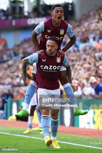 Danny Ings of Aston Villa celebrates scoring the opening goal with Jacob Ramsey during the Premier League match between Aston Villa and Everton FC at...