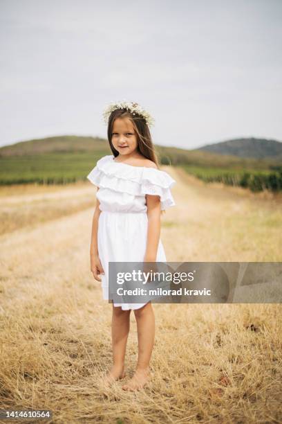 beautiful people in white outfit posing in vineyard. - girl white dress stock pictures, royalty-free photos & images