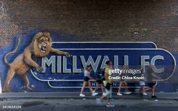 Millwall FC fans arrive at the stadium ahead of the Sky Bet Championship between Millwall and Coventry City at The Den on August 13, 2022 in London,...