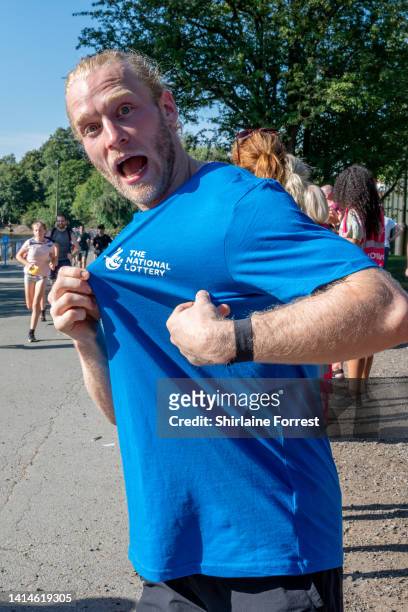 Jonnie Peacock poses during The National Lottery Park Run at Heaton Park on August 13, 2022 in Manchester, England.