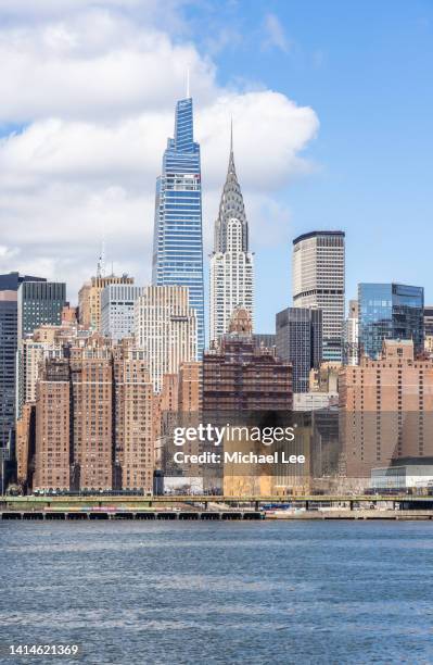 sunny view of midtown manhattan in new york - lee river stock pictures, royalty-free photos & images