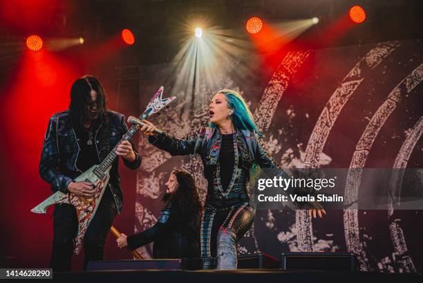 Sharlee D'Angelo and Alissa White-Gluz of Arch Enemy perform on stage during the Knotfest at Artukainen Event Park on August 12, 2022 in Turku,...