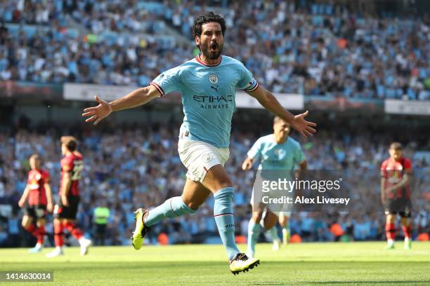 Ilkay Guendogan of Manchester City celebrates after scoring their sides first goal during the Premier League match between Manchester City and AFC...