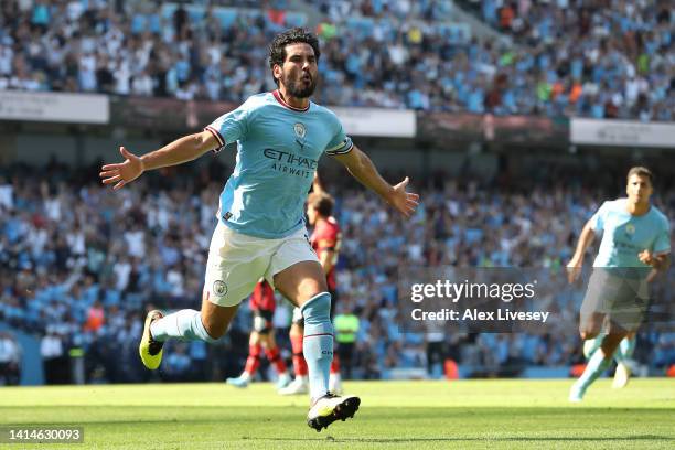 Ilkay Guendogan of Manchester City celebrates after scoring their sides first goal during the Premier League match between Manchester City and AFC...