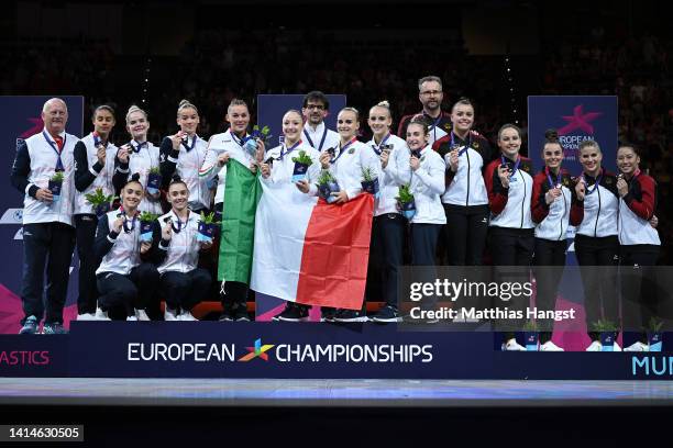 Gold Medalists, Team Italy, Silver Medalists, Team Great Britain and Bronze Medalists, Team Germany celebrate in the Medal Ceremony following the...