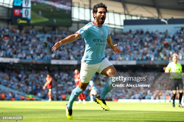 Ilkay Guendogan of Manchester City celebrates after scoring their sides first goal during the Premier League match between Manchester City and AFC...