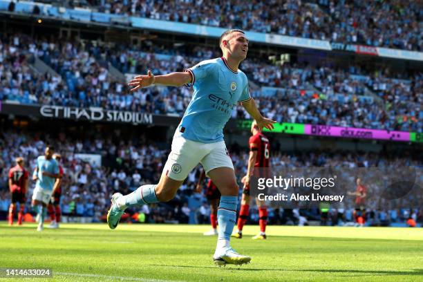 Phil Foden of Manchester City celebrates after scoring their sides third goal during the Premier League match between Manchester City and AFC...