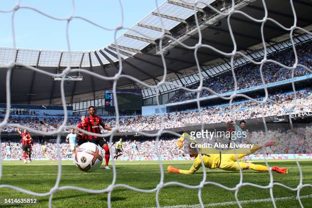 Ilkay Guendogan of Manchester City scores their sides first goal during the Premier League match between Manchester City and AFC Bournemouth at...