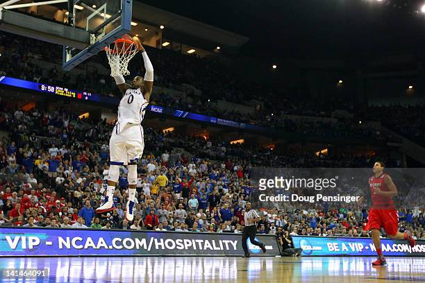 Thomas Robinson of the Kansas Jayhawks dunks in the first half against the Detroit Titans during the second round of the 2012 NCAA Men's Basketball...