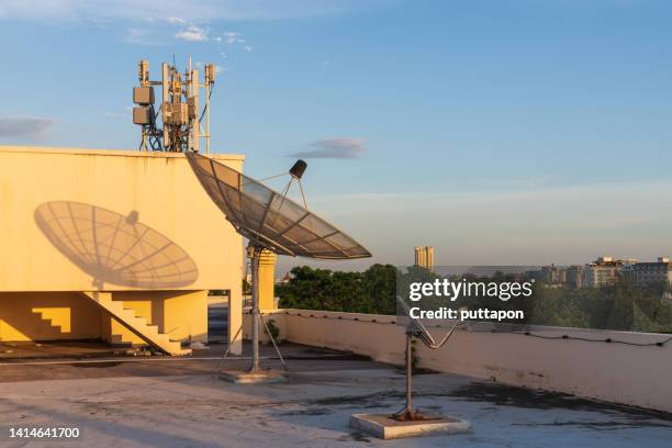 tellite dish antenna on top of the building - broadcasting house stock pictures, royalty-free photos & images