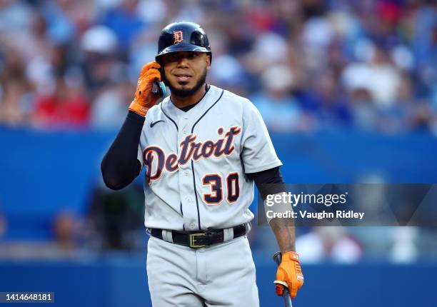 Harold Castro of the Detroit Tigers adjusts his helmet against the Toronto Blue Jays at Rogers Centre on July 28, 2022 in Toronto, Ontario, Canada.