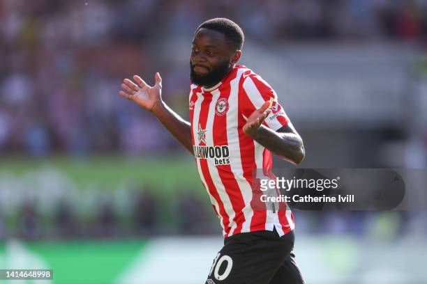Josh Dasilva of Brentford celebrates after scoring their sides first goal during the Premier League match between Brentford FC and Manchester United...