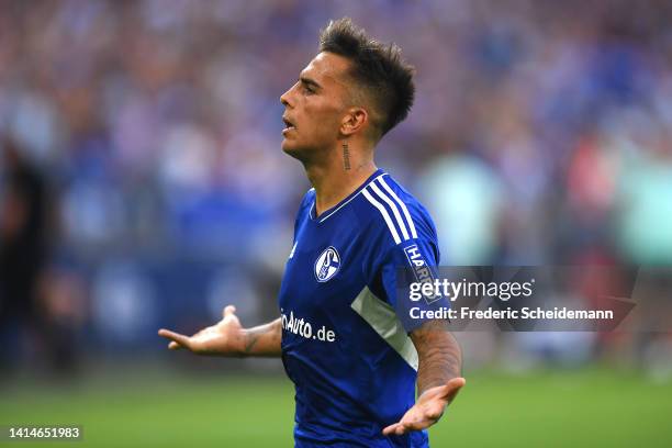 Rodrigo Zalazar of FC Schalke 04 celebrates after scoring their sides first goal during the Bundesliga match between FC Schalke 04 and Borussia...