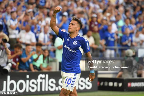 Rodrigo Zalazar of FC Schalke 04 celebrates after scoring their sides first goal during the Bundesliga match between FC Schalke 04 and Borussia...