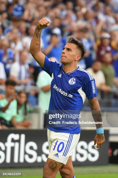 Rodrigo Zalazar of FC Schalke 04 celebrates after scoring their sides first goal during the Bundesliga match between FC Schalke 04 and Borussia...