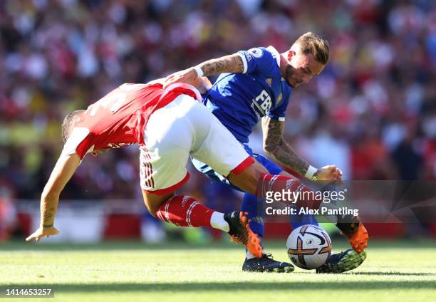 James Maddison of Leicester City is tackled by Granit Xhaka of Arsenal during the Premier League match between Arsenal FC and Leicester City at...