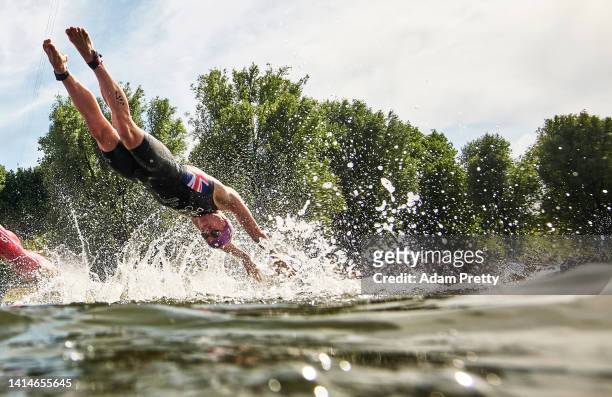 Daniel Dixon of Great Britain dives to enter the water in the swimming stage during the Elite Men's Triathlon competition on day 3 of the European...