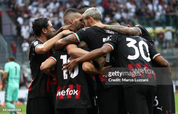 Ante Rebic of AC Milan celebrates his second goal with his team-mates during the Serie A match between AC MIlan and Udinese Calcio at Stadio Giuseppe...