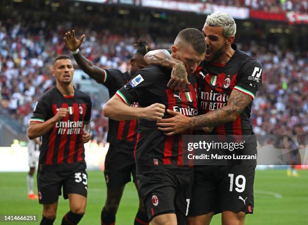 Ante Rebic of AC Milan celebrates his first goal with his team-mate Theo Hernandez during the Serie A match between AC MIlan and Udinese Calcio at...