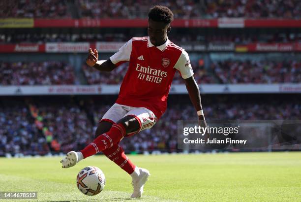 Bukayo Saka of Arsenal in action during the Premier League match between Arsenal FC and Leicester City at Emirates Stadium on August 13, 2022 in...