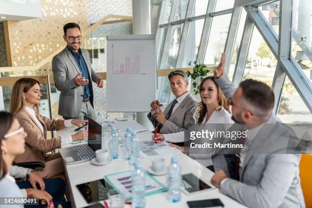 business people having business meeting in the office - finance report stock pictures, royalty-free photos & images
