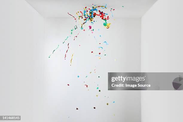 streamers and confetti in mid air - exploding confetti stock pictures, royalty-free photos & images