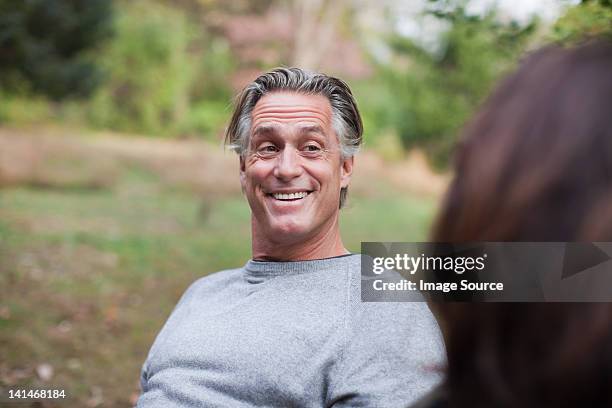 mature man smiling - man with gray hair stock pictures, royalty-free photos & images