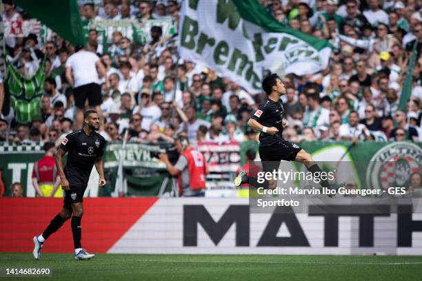 Wataru Endo of Stuttgart celebrates after scoring his team's first goal during the Bundesliga match between SV Werder Bremen and VfB Stuttgart at...