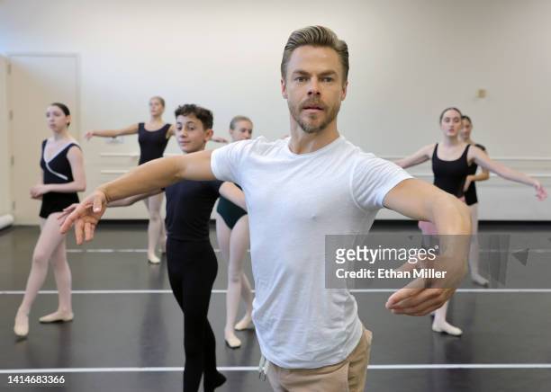 Television personality and dancer Derek Hough dances with students at the Academy of Nevada Ballet Theatre on August 13, 2022 in Las Vegas, Nevada....