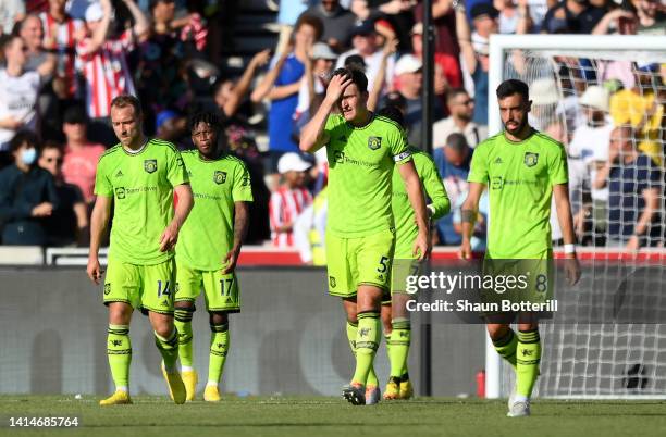 Harry Maguire of Manchester United looks dejected during the Premier League match between Brentford FC and Manchester United at Brentford Community...