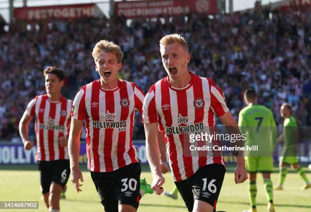 Ben Mee of Brentford celebrates after he scores the third goal during the Premier League match between Brentford FC and Manchester United at...