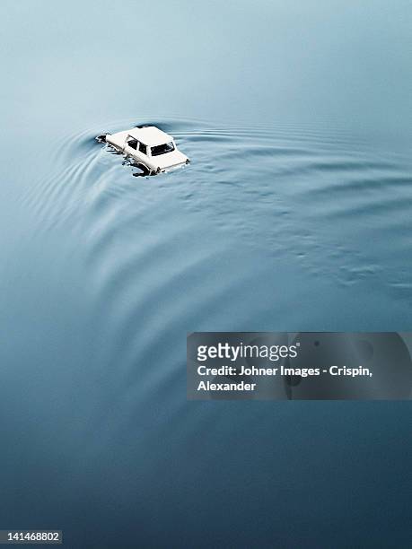 toy car drowning in water - toy car accident stock pictures, royalty-free photos & images