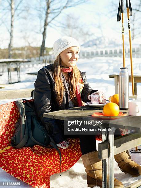 young woman resting after skiing - sweden snow stock pictures, royalty-free photos & images