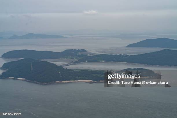 islands in incheon city of south korea aerial view from airplane - yellow sea stock-fotos und bilder