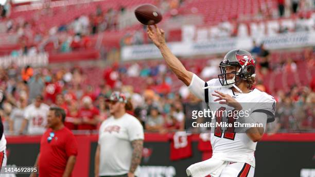 Blaine Gabbert of the Tampa Bay Buccaneers warms up during a preseason game against the Miami Dolphins at Raymond James Stadium on August 13, 2022 in...
