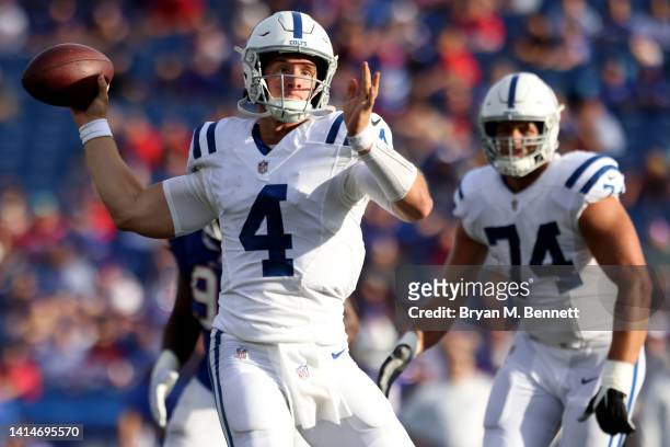 Sam Ehlinger of the Indianapolis Colts passes the ball during the fourth quarter of a preseason game against the Buffalo Bills at Highmark Stadium on...