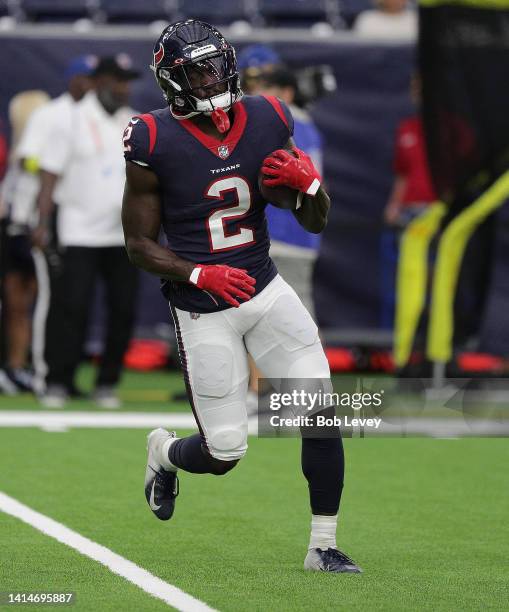 Marlon Mack of the Houston Texans warms up during a preseason game against the New Orleans Saints at NRG Stadium on August 13, 2022 in Houston, Texas.