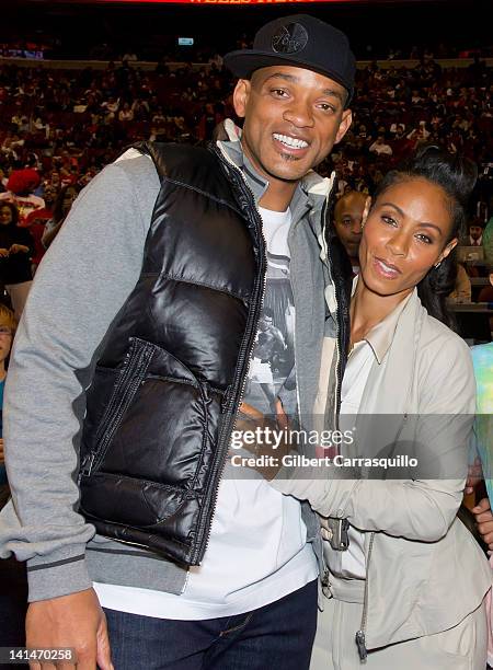 Will Smith and Jada Pinkett Smith attend the Miami Heat vs. The Philadelphia 76ers game at Wachovia Center on March 16, 2012 in Philadelphia,...