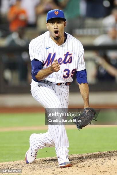 Edwin Diaz of the New York Mets reacts after pitching the final out during the ninth inning against the Philadelphia Phillies at Citi Field on August...