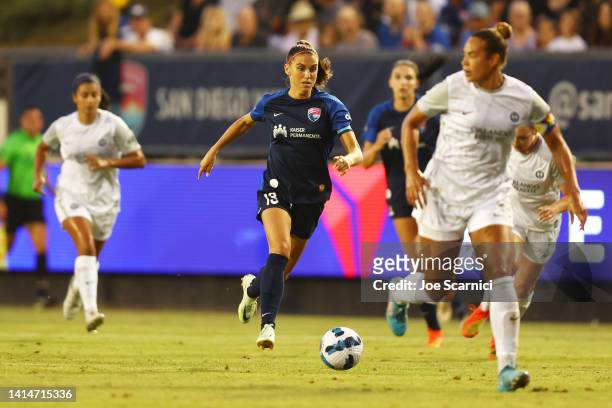 Alex Morgan of the San Diego Wave FC dribbles the ball during the first half against Orlando Pride at Torero Stadium on August 13, 2022 in San Diego,...