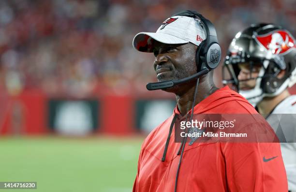 Head coach Todd Bowles of the Tampa Bay Buccaneers looks on during a preseason game against the Miami Dolphins at Raymond James Stadium on August 13,...