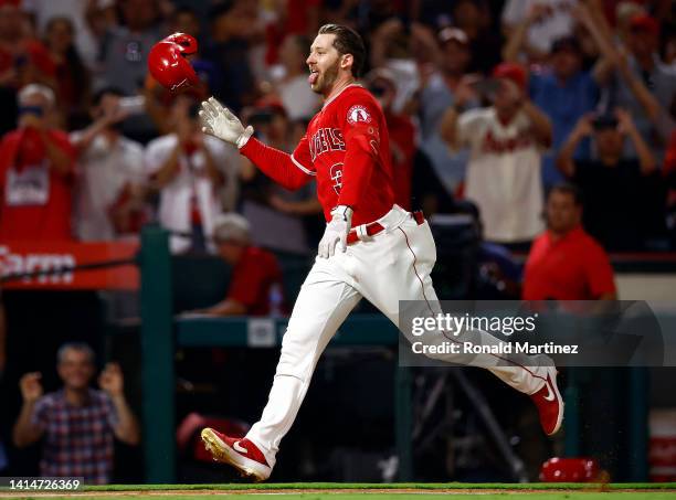 Taylor Ward of the Los Angeles Angels celebrates after hitting a walk-off home run against the Minnesota Twins in the eleventh inning at Angel...